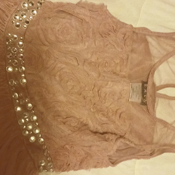 I am selling a rose pink dress. The size is a 12 - Picture 3 of 4